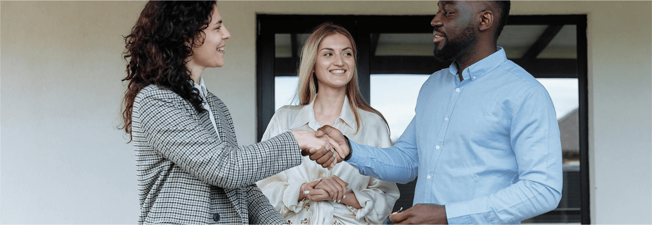 A handshake after agreeing on a home sale